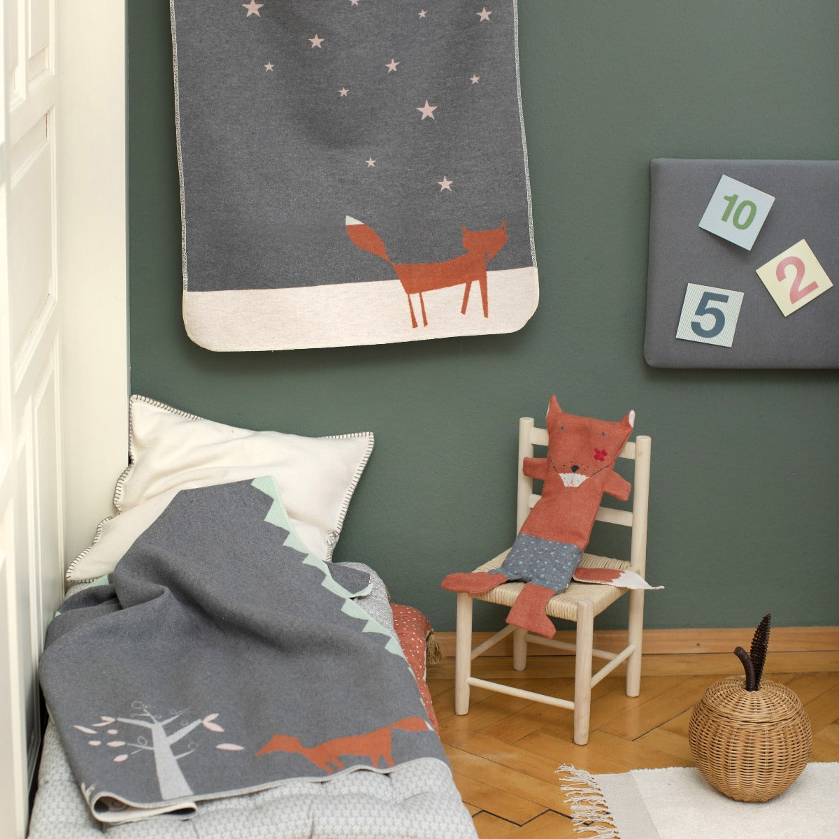 David Fusseneeger Toddler Blanket Fox Print hanging in a room