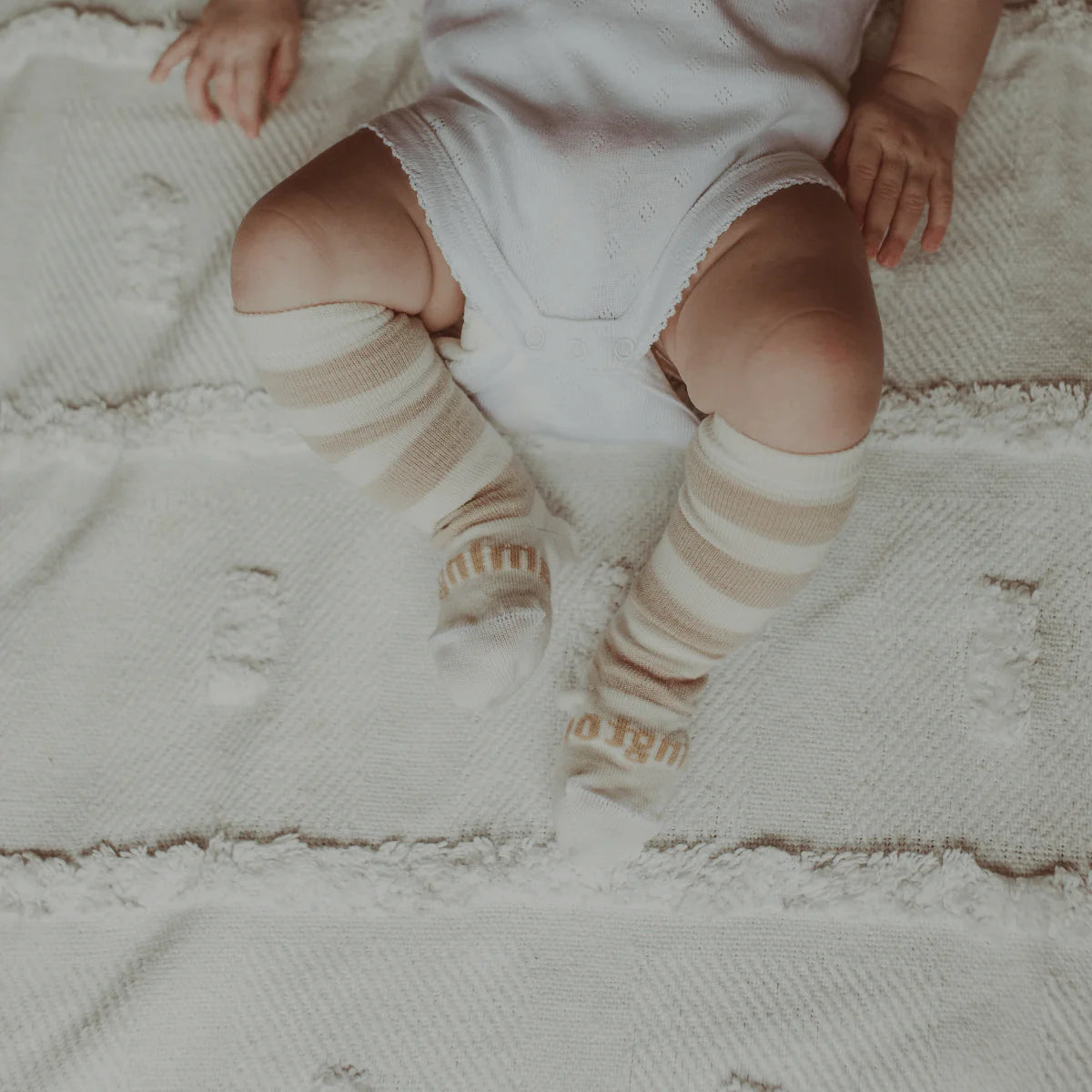 Baby wearing Merino Wool Kneehigh socks from Lamington