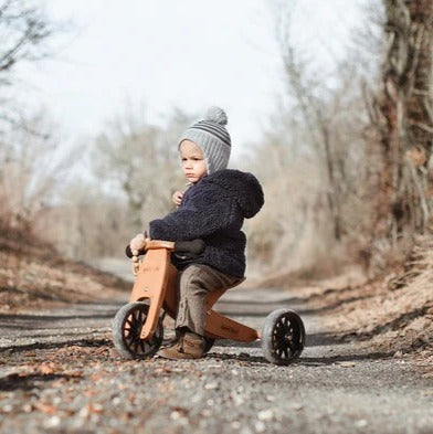 little toddler riding Kinderfeets Tiny Tot
