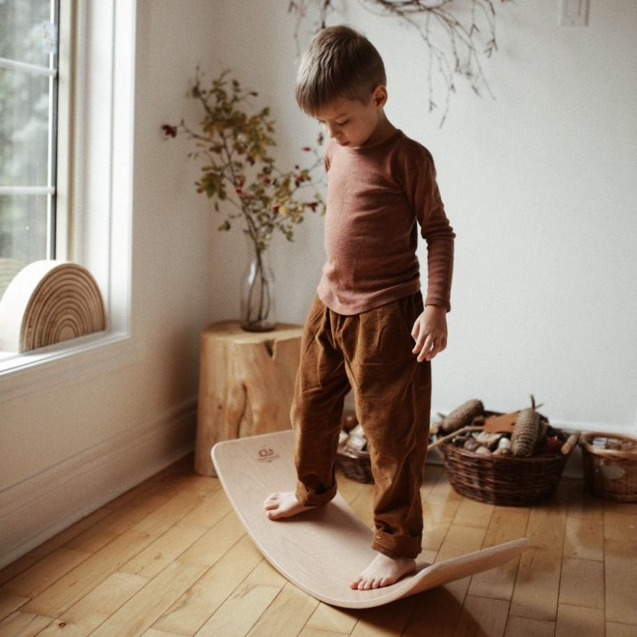 Child standing on Kinderfeets Lite Board