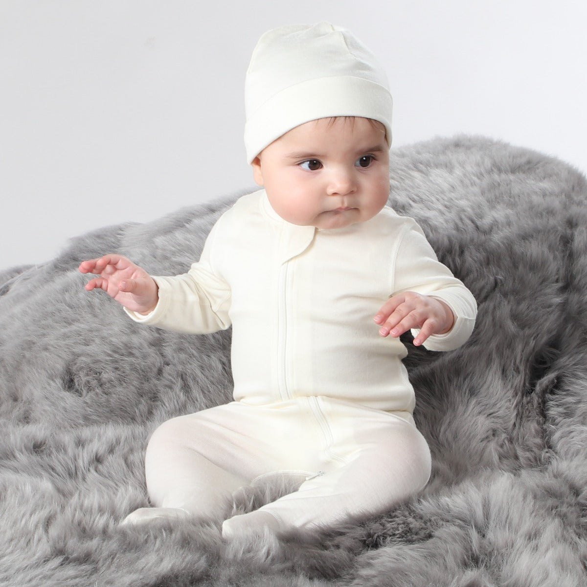 Little Bee Merino Zip up babygrow in cream