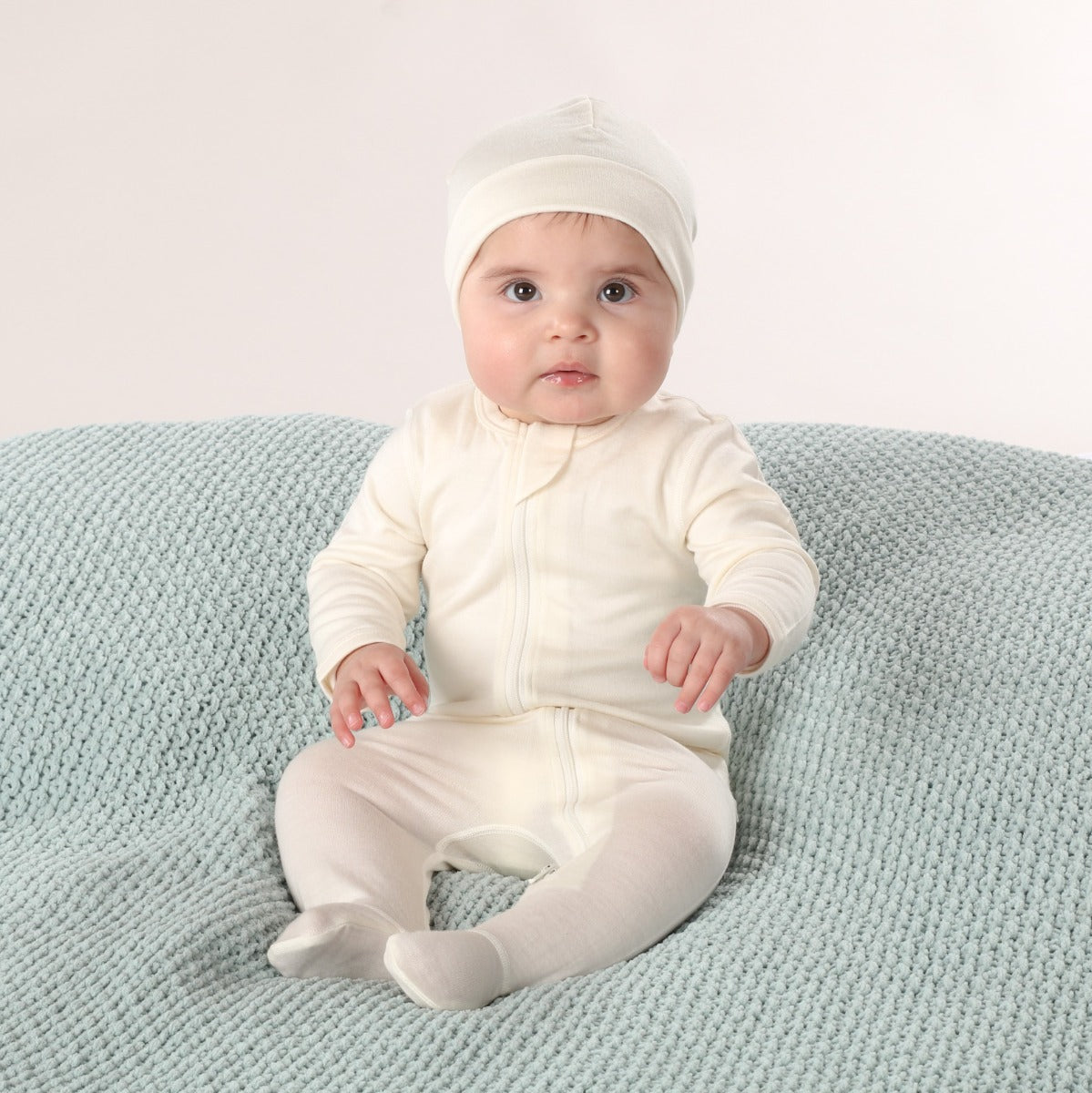 Little Bee Merino Zip up babygrow in cream