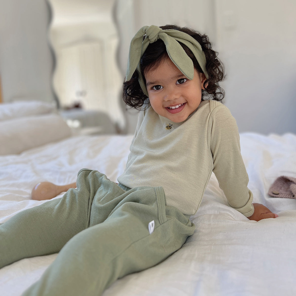 Arctic Adventure Merino Pants in Moss in Moss colour from dimples New Zealand pairing it with tea green sleeve top