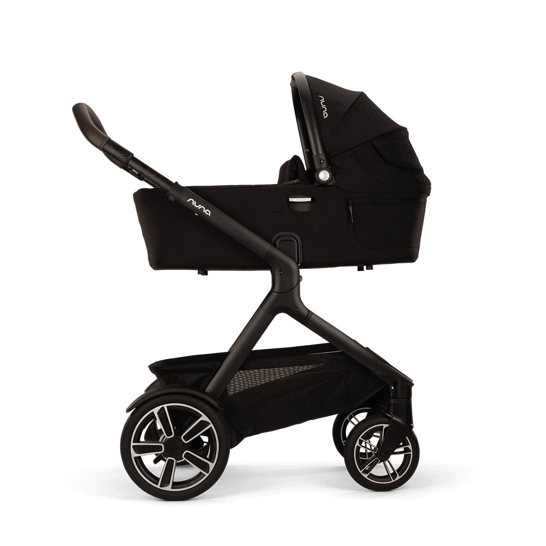Nuna Demi Next Carry Cot side view attached with one click on stroller