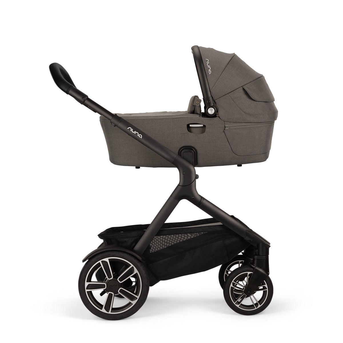 Demi Next granite Carry Cot from Nuna side view attached with a stroller or pram
