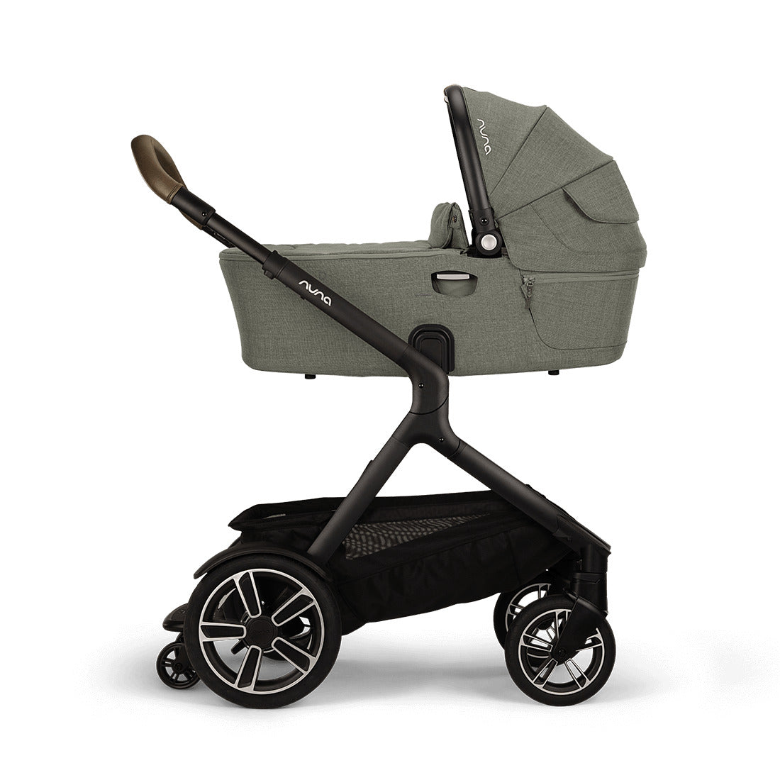 Demi Next Pine Carry Cot from Nuna side view attached with a stroller