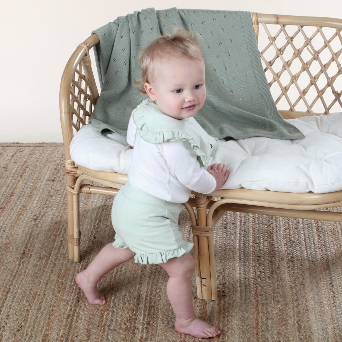 cotton frill bib in sage dimples