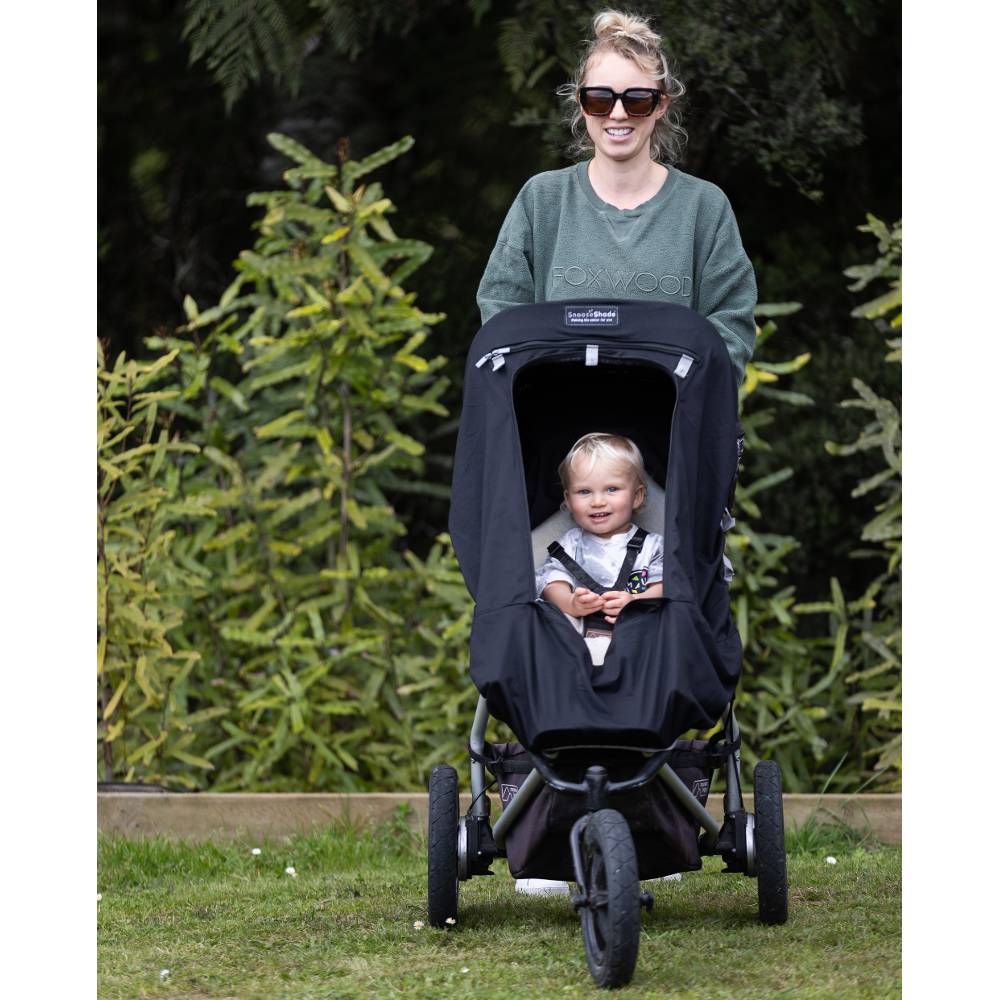 Snooze shade attached to stroller