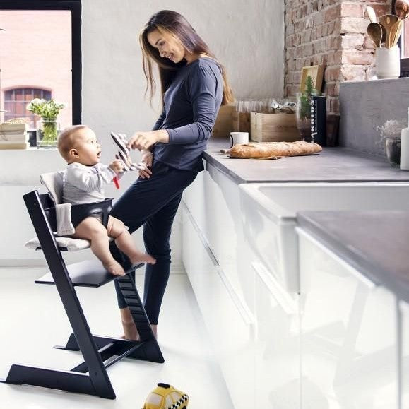 Stokke Tripp Trapp Highchair in Black lifestyle of baby and mum in kitchen