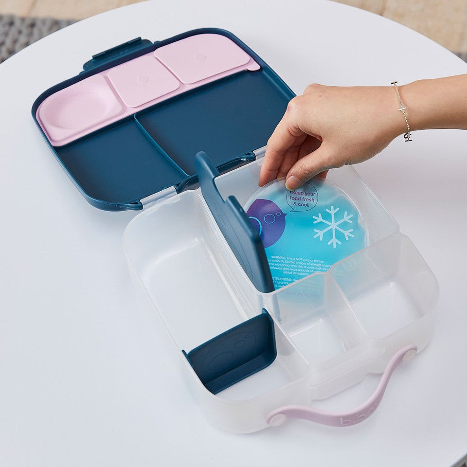 Lady putting B.Box Gel Cooler Twin Pack in a lunch box