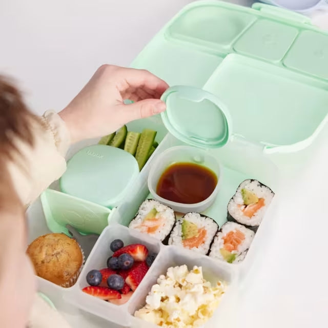 B.Box Kids Lunch Box spearmint colour with food in it