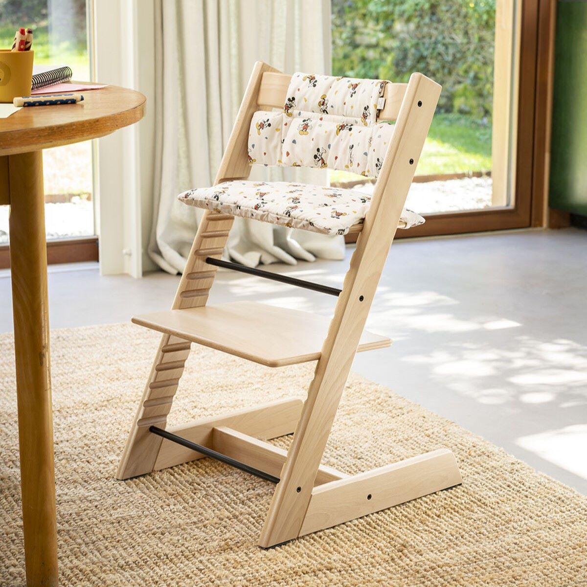 Tripp Trapp cushion in Mickey celebration print on highchair