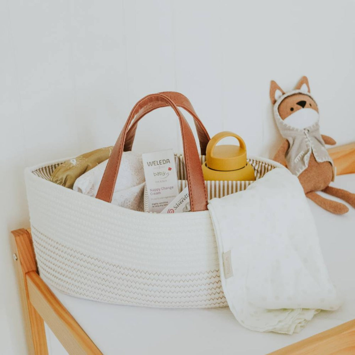 Nestling nappy caddy in white