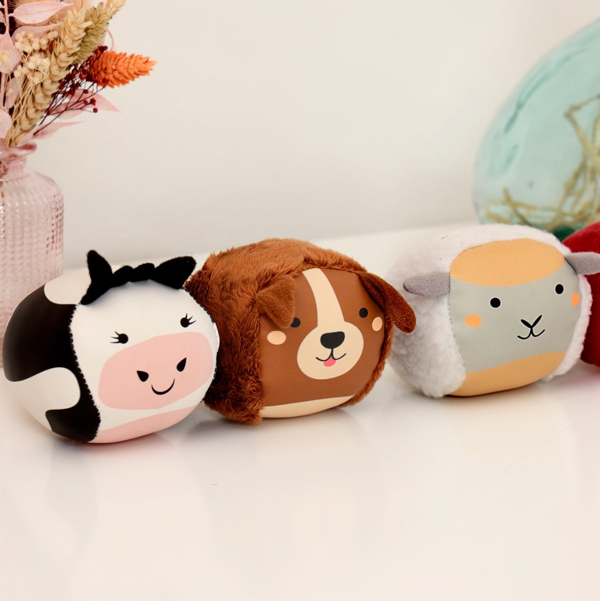 Roly Poly farm animals soft balls on a table