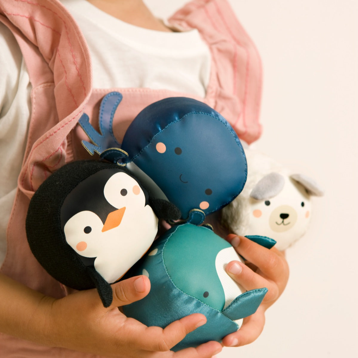Girl holding Aquatic animals theme Roly Poly Plush Balls