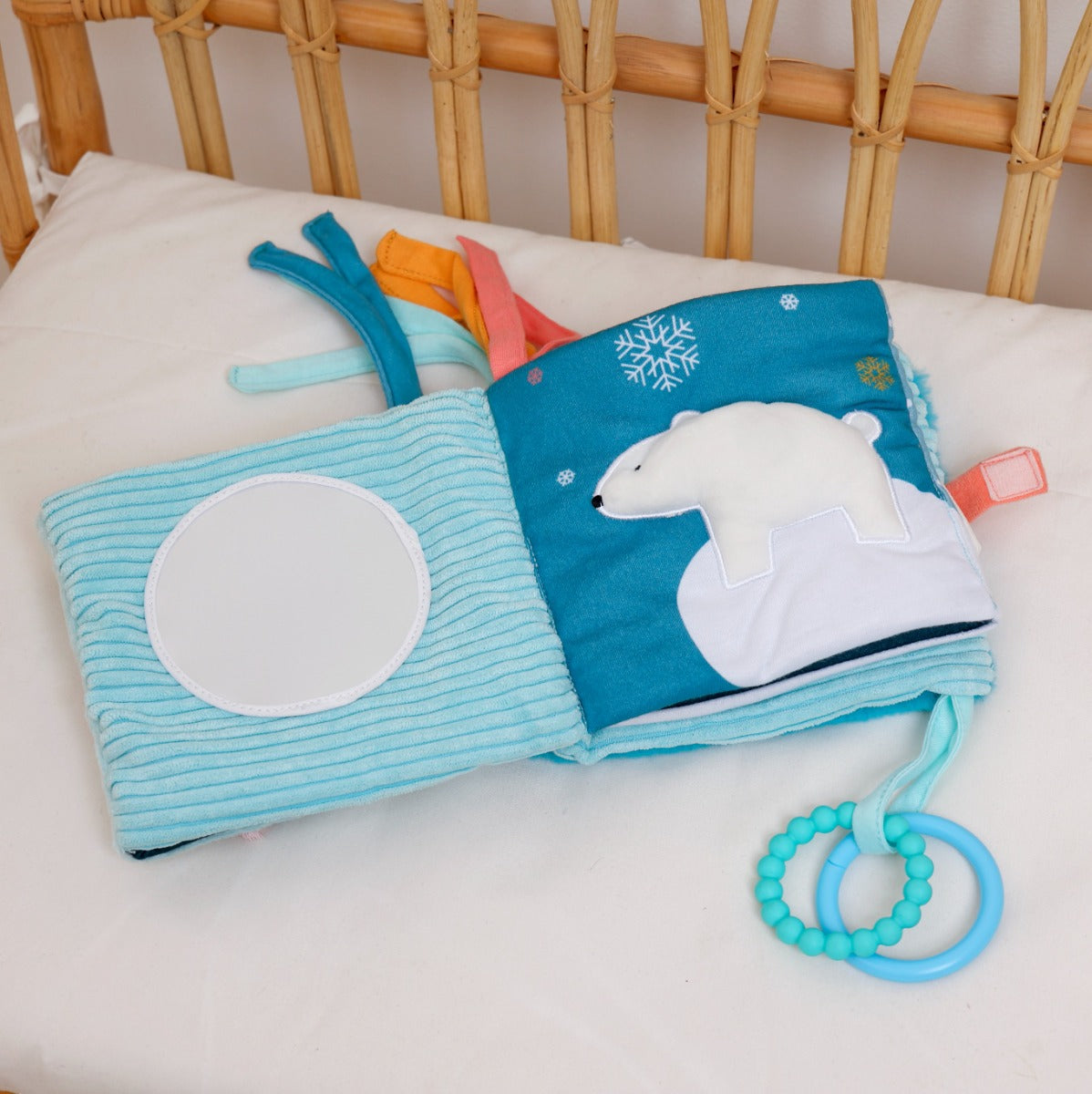 Little Big Friends Activity Book in ocean in cot