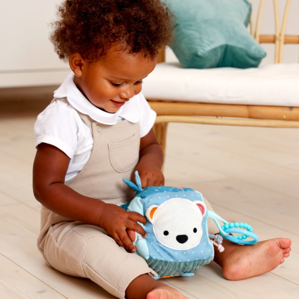 Kid playing with Little Big Friends Soft Activity Cube Ocean 