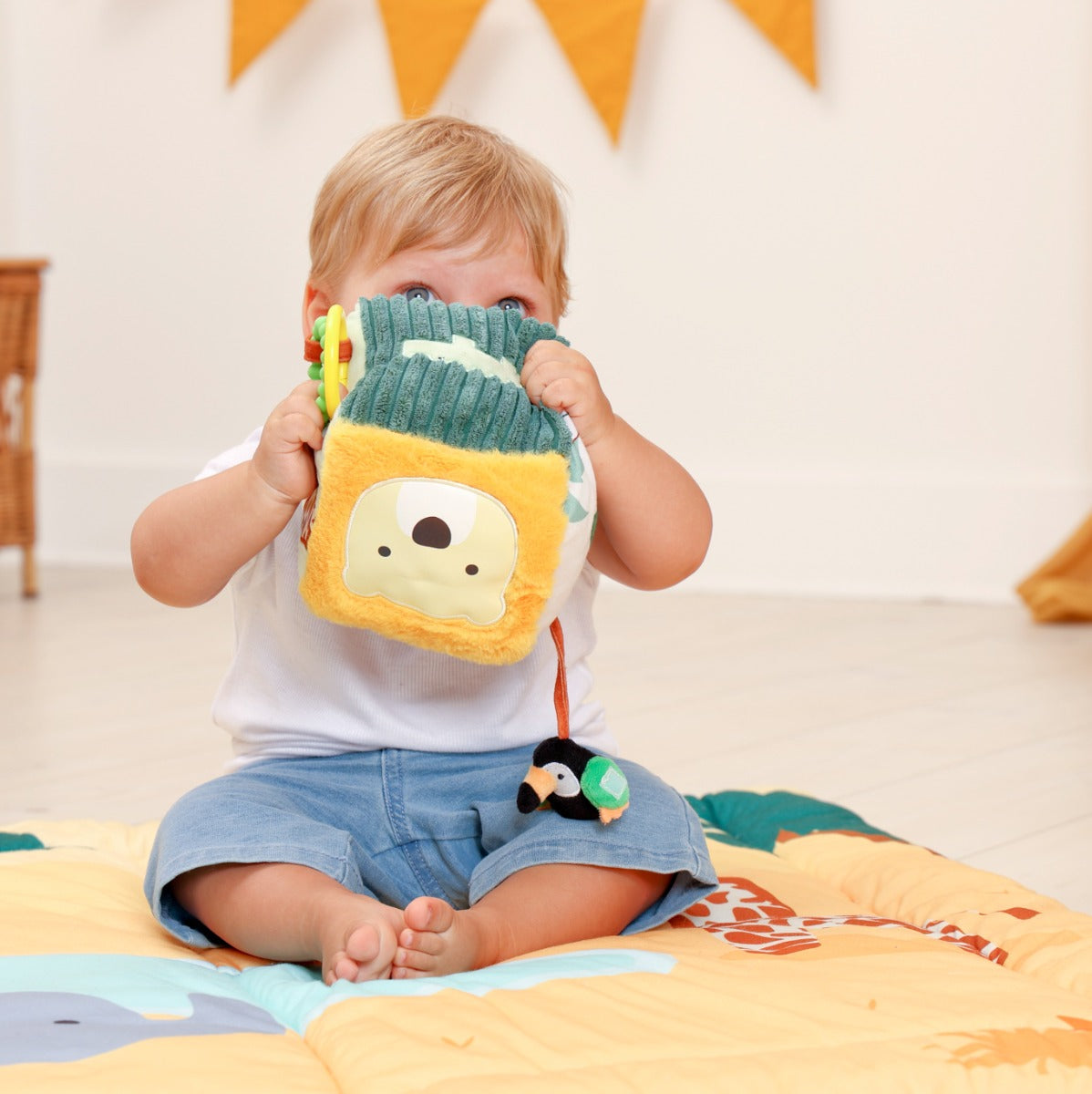 Baby playing with Little Big Friends Soft Activity Cube Jungle