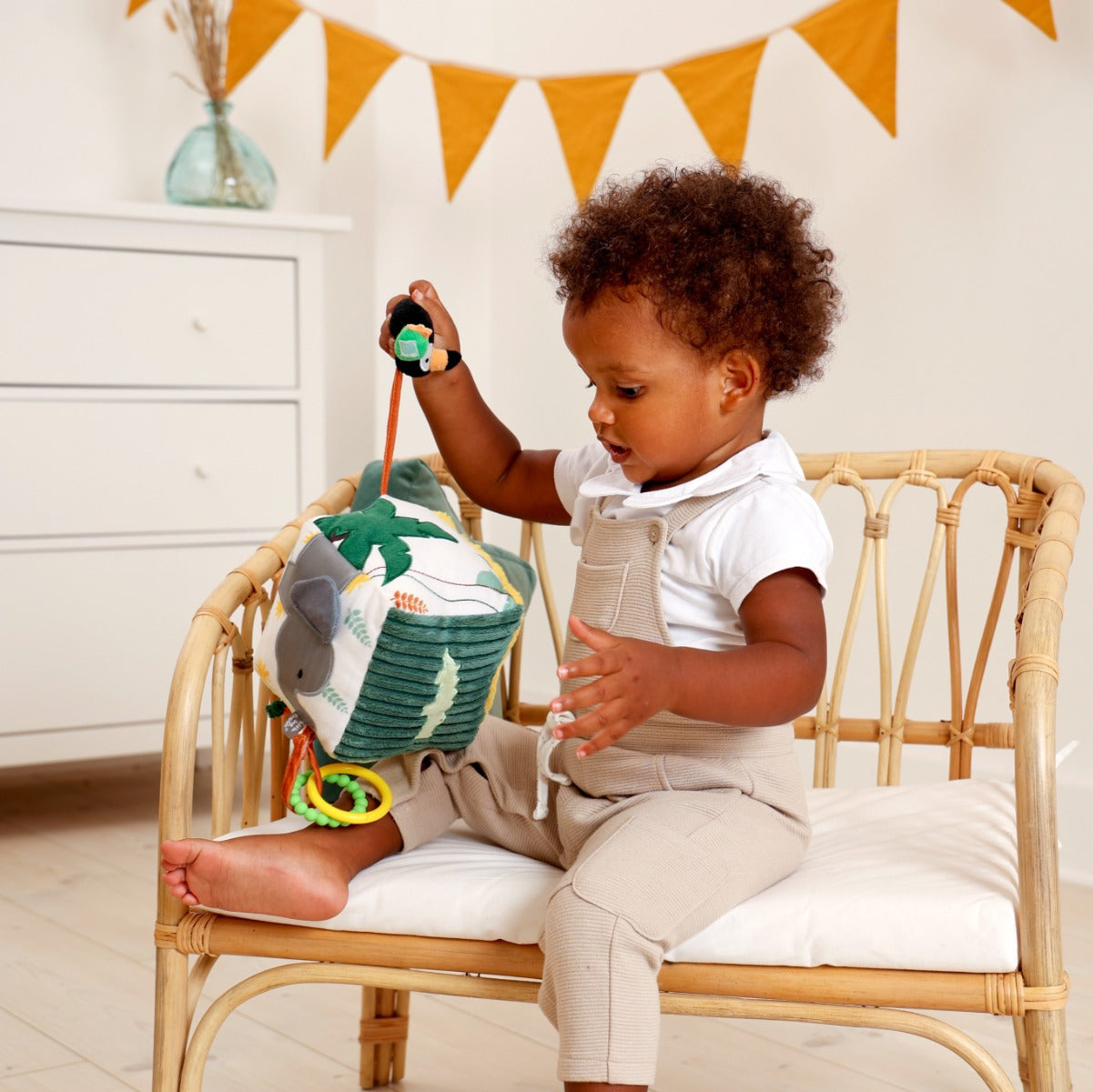 Baby playing with Little Big Friends Soft Activity Cube Jungle