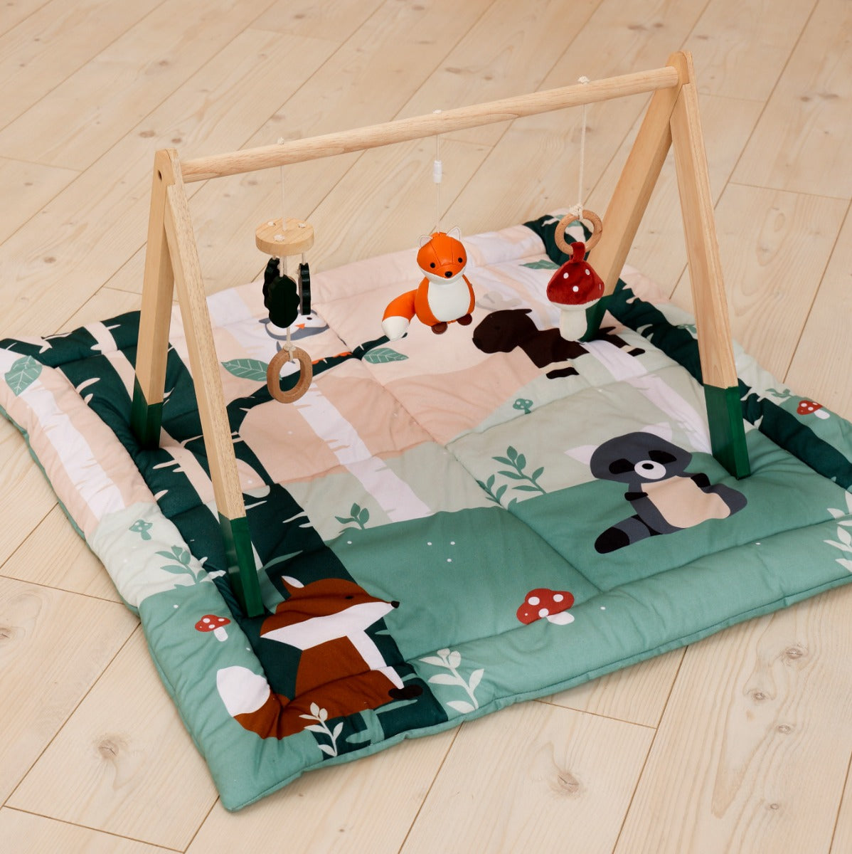Little Big Friends Patchwork kids reversible playmat and wooden activity gym
