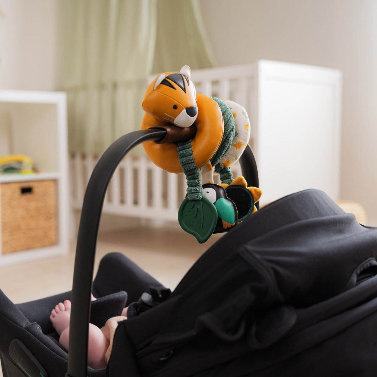 Baby playing in capsule with Tiger head jungle theme activity spiral for kids from little big friends