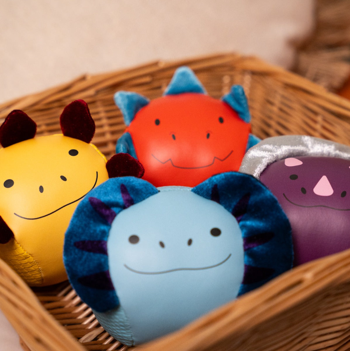 Roly Poly Soft dino animals balls from little big friends in a basket