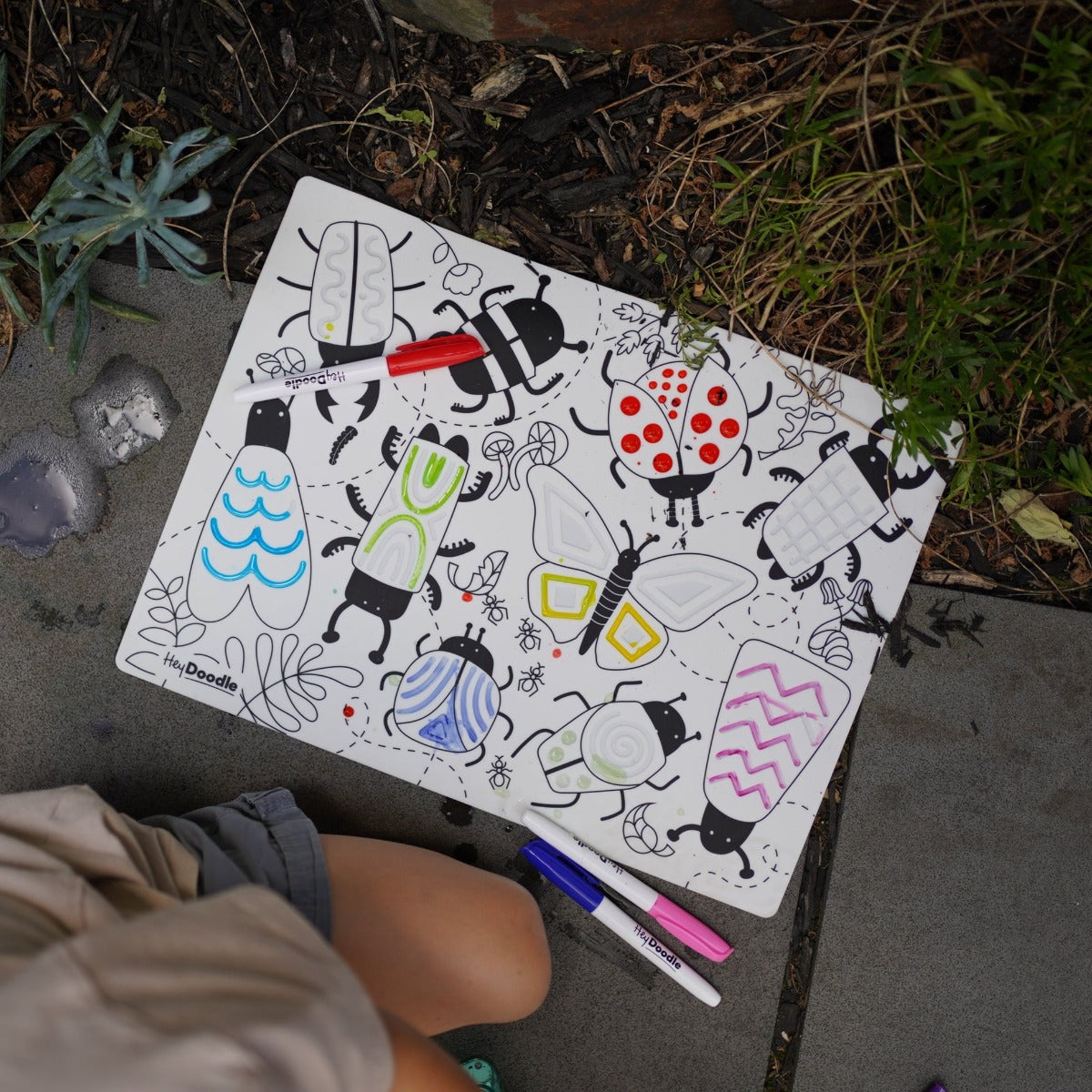 HeyDoodle Busy Bugs sensory playmat outside 