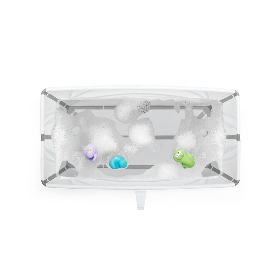 Stokke XL Flexi bath in white with water and toys