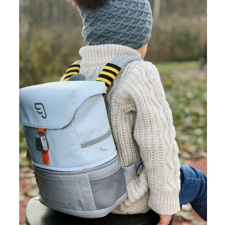 Toddler Wearing JetKids™ by Stokke® Crew Backpack in Sky Blue