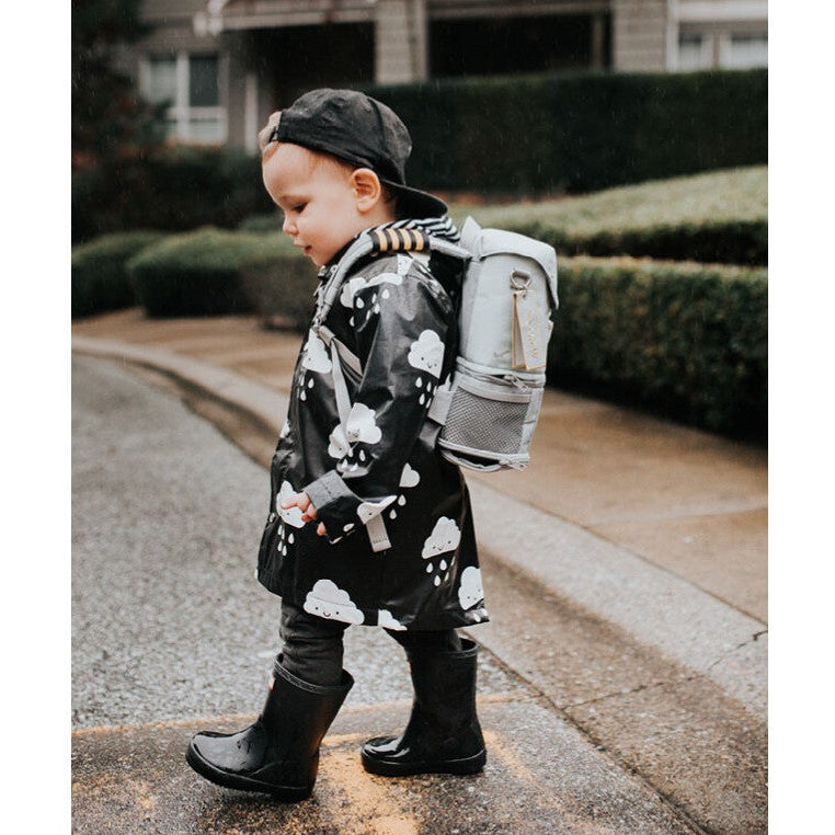 Toddler Wearing JetKids™ by Stokke® Crew Backpack in Green Aurora