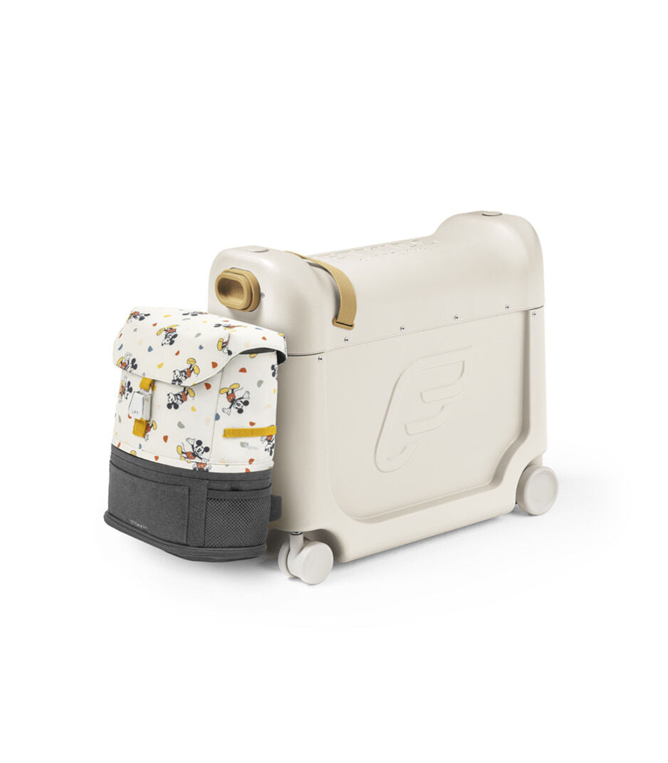JetKids™ by Stokke® Crew Backpack Mickey Celebration attached to stokke bedbox