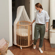 stokke sleepi mini v3 in natural with drape and drape rod