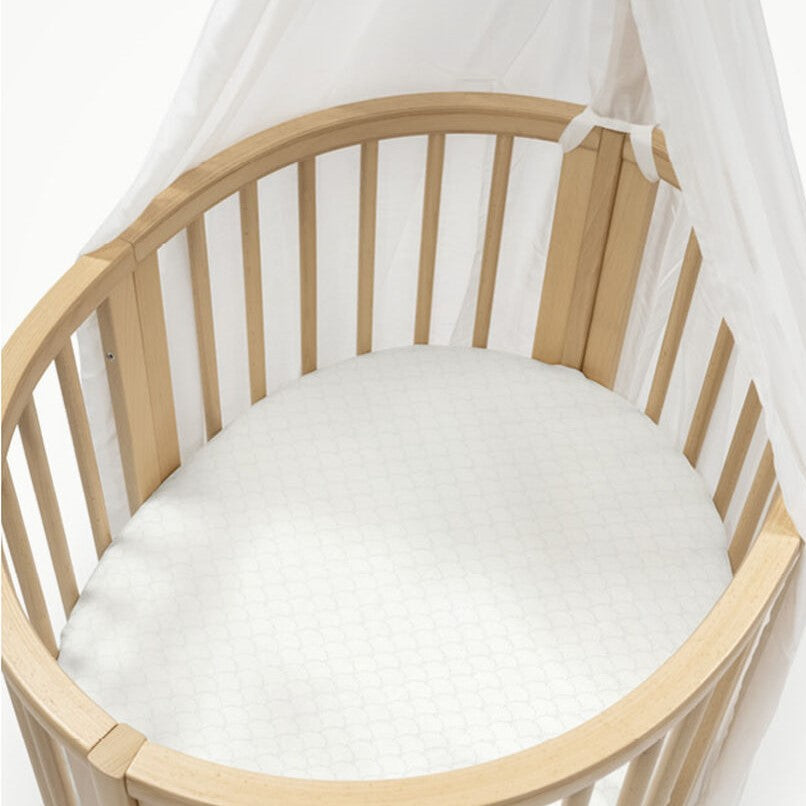 Sleepi Mini fitted sheet in fans grey by stokke in cot