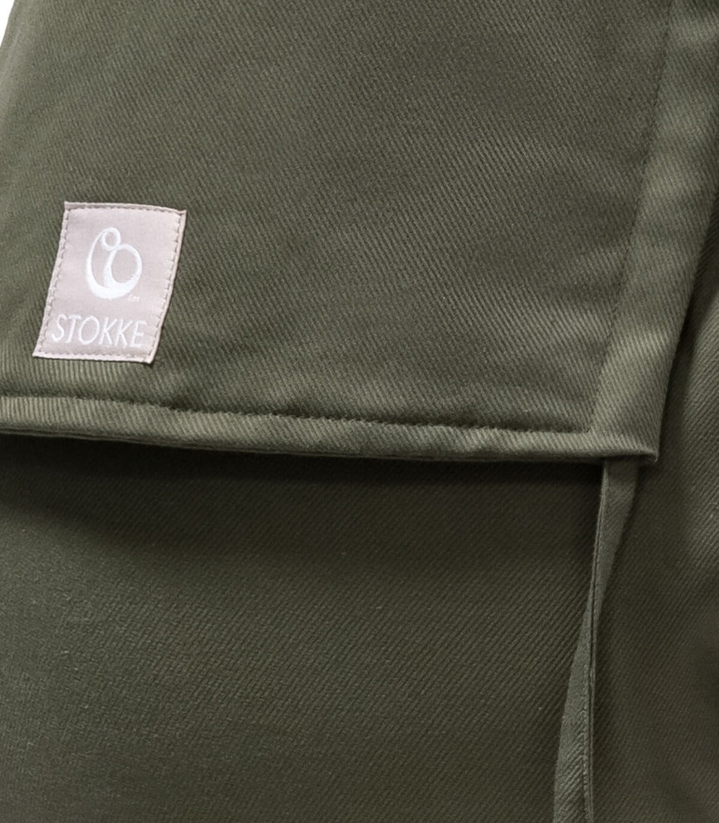 limas carrier by stokke in olive green close up