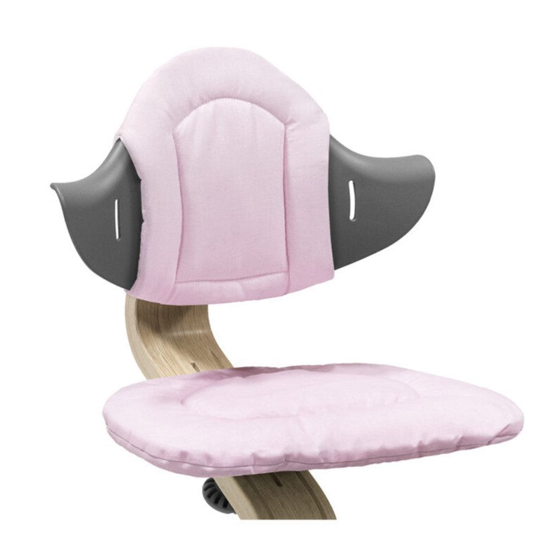 Nomi Pink cushion from Stokke attached in a chair:image,small_image,thumbnail,swatch_image