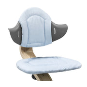 Nomi Blue cushion from Stokke attached in a chair:image,small_image,thumbnail,swatch_image