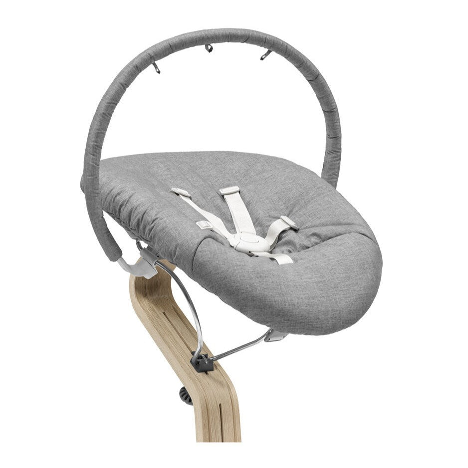 Nomi chair play accessory in grey on a new born set