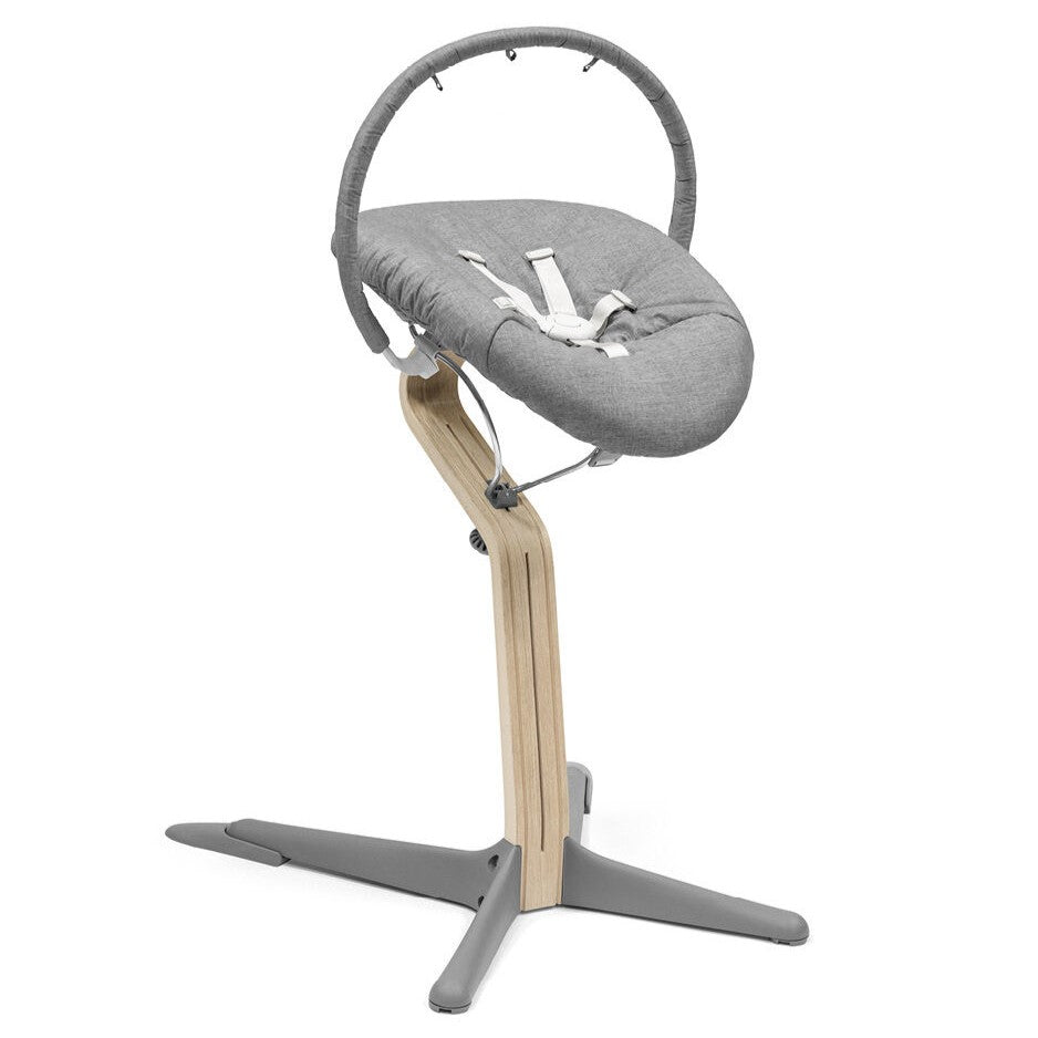 Nomi chair play accessory in grey on a new born set