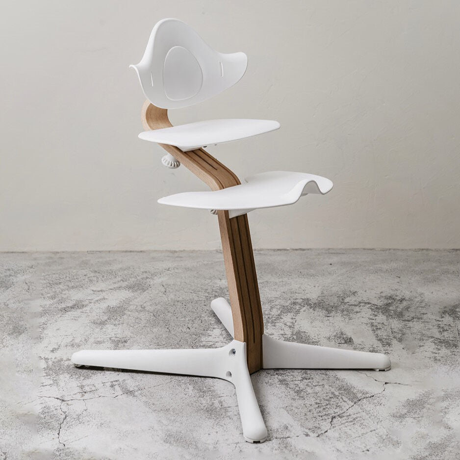 Nomi Natural white highchair from Stokke. 