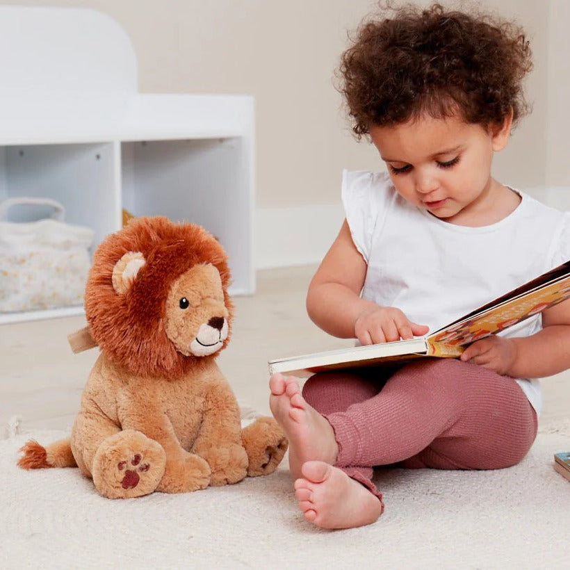 Little girl reading to Cloud.b Louis Lion Smart Sensor