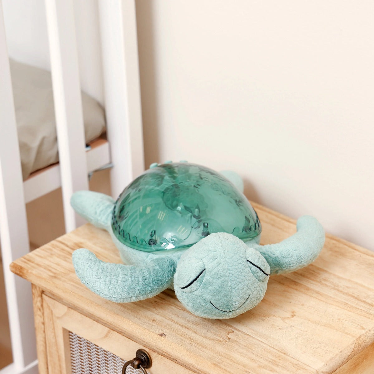 Cloud.b Tranquil Turtle Green sitting on side table
