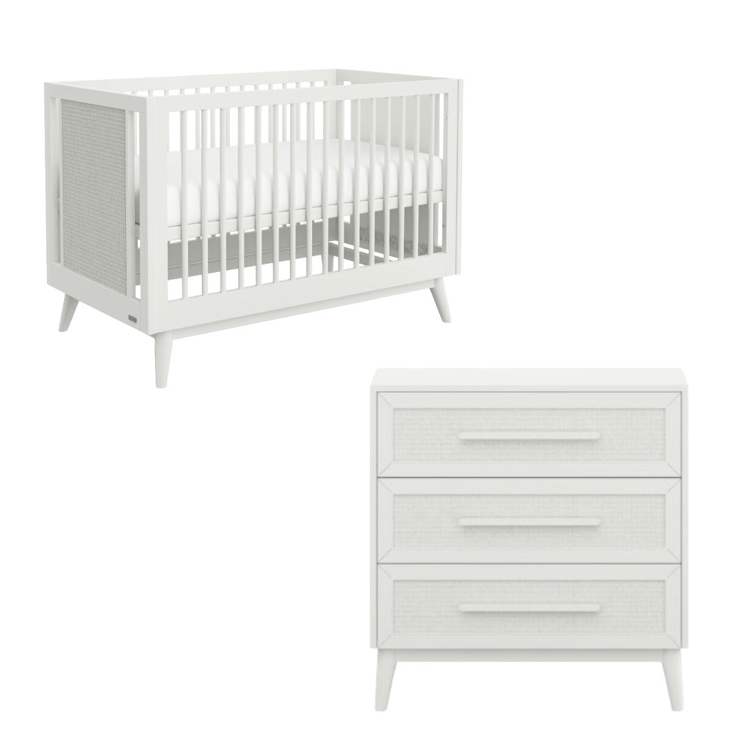 White crib and dresser set on a white background