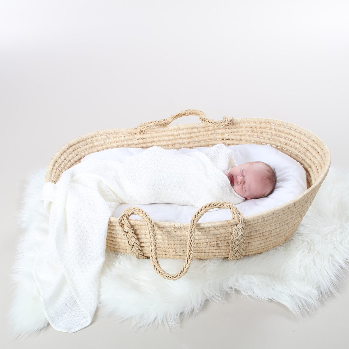 Dimples merino wool eyelet blanket in ivory 