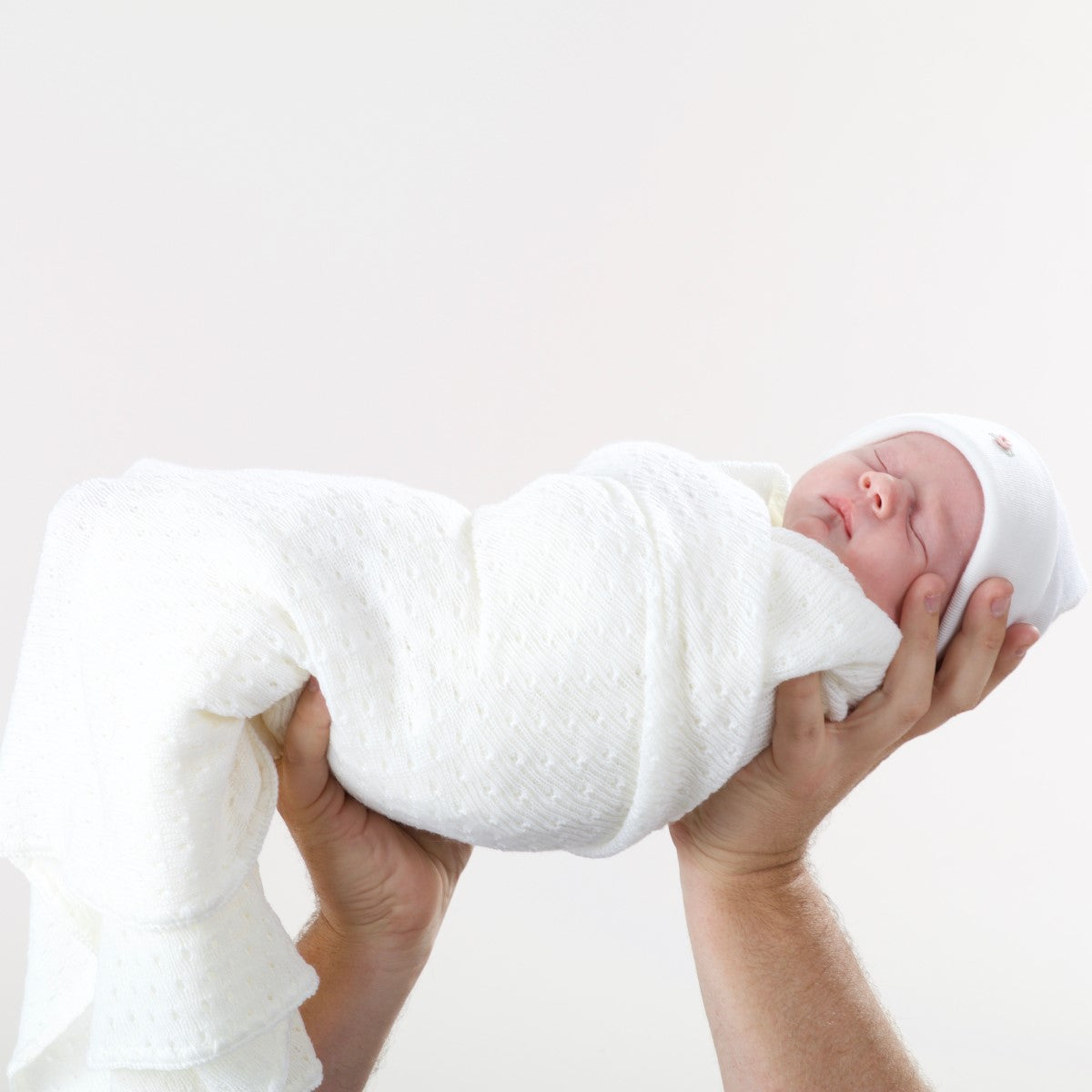 Dimples merino wool eyelet blanket in ivory 