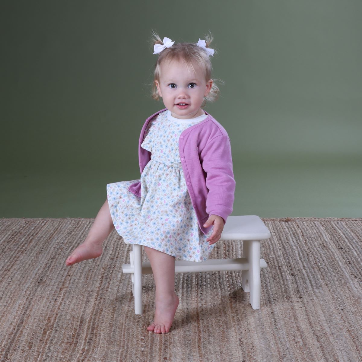 baby girl wearing orchid cardigan from dimples arctic adventures collection