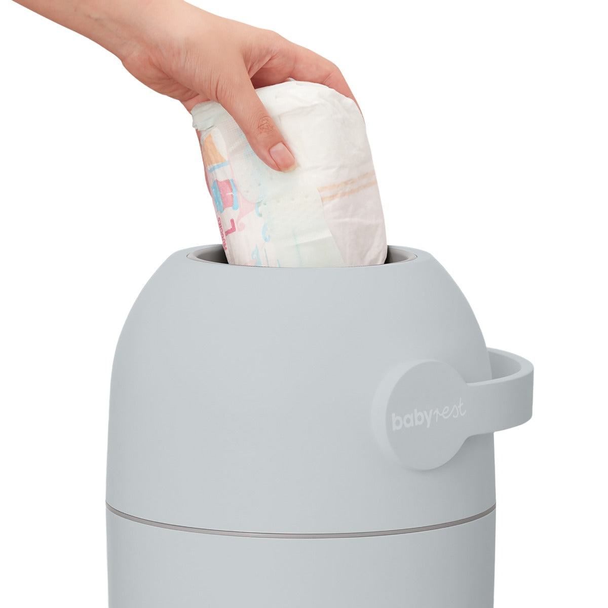 Throwing a nappy in Babyrest Aster Nappy Bin in Grey colour.