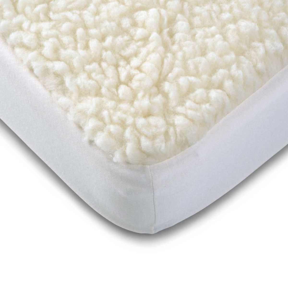 Babyrest Lambswool Cot Underlay close up on mattress