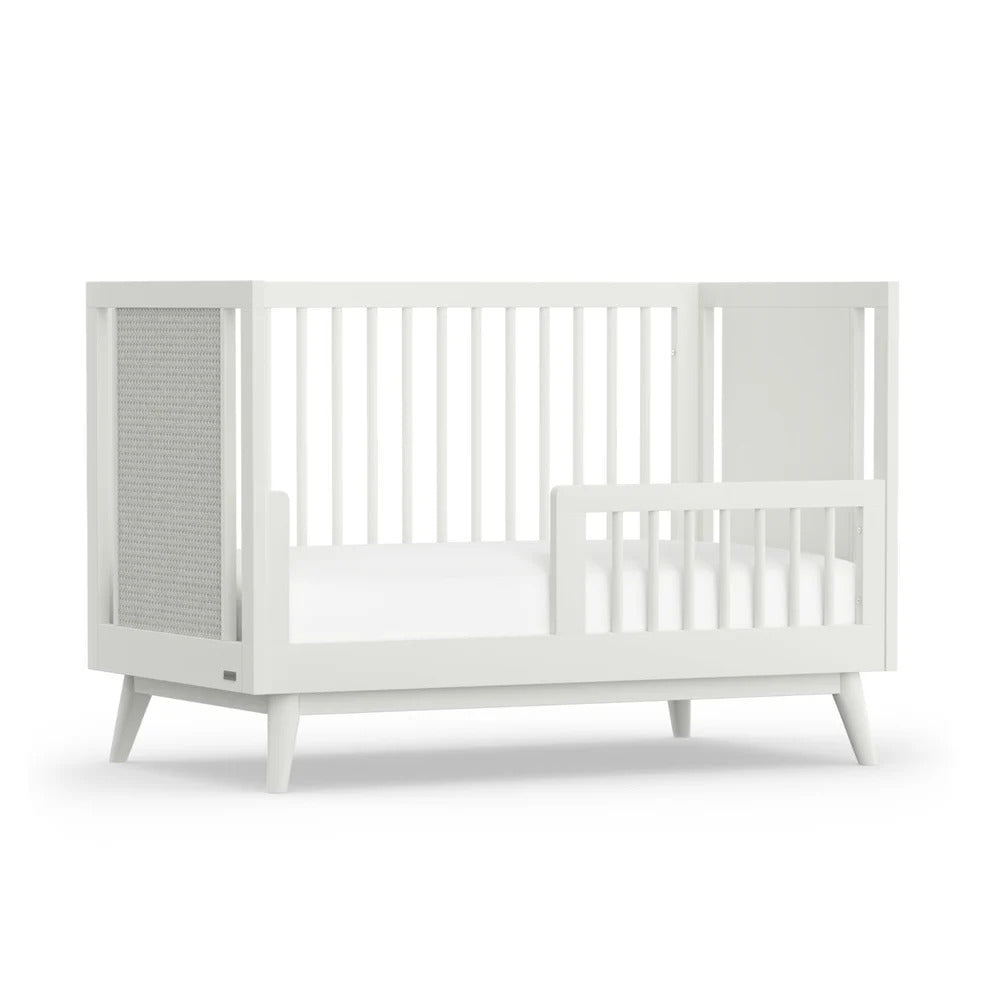 Kaya Cot Bed rail in white on kaya cot angled view