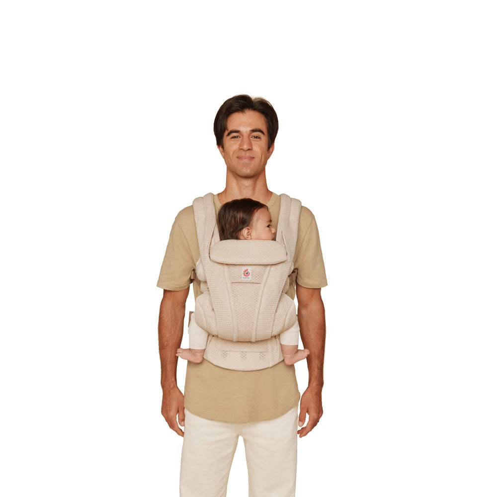 Front view father carrying baby in mesh breathable baby carrier