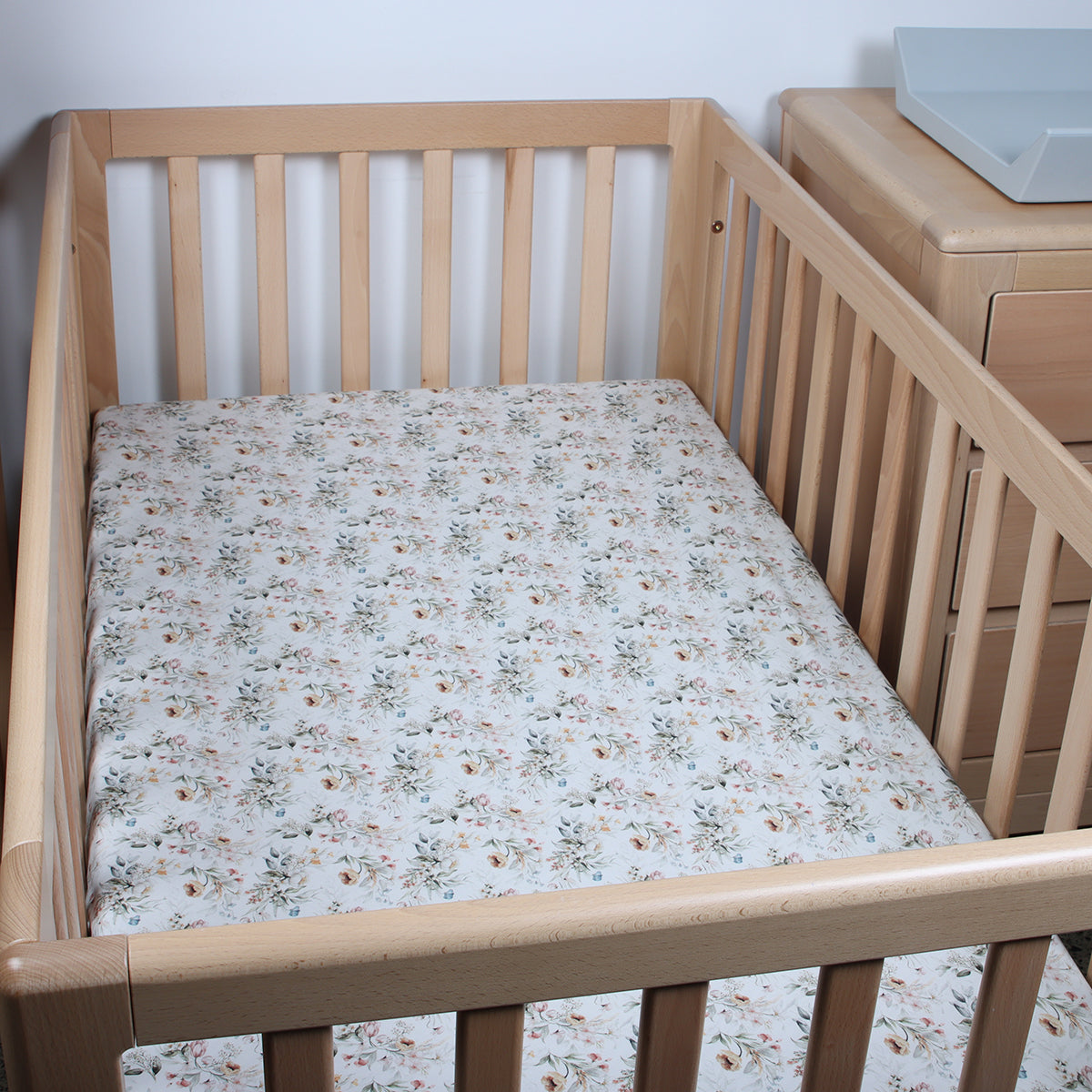 fitted cot sheet in floral print used in amara cot